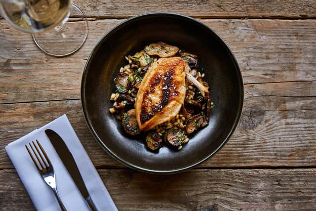 Roasted chicken breast with wild mushrooms and pearl barley.