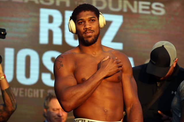 Anthony Joshua weighs in for his fight with Andy Ruiz Jr at the Al Faisaliah Hotel in Riyadh, Saudi Arabia eariler today.