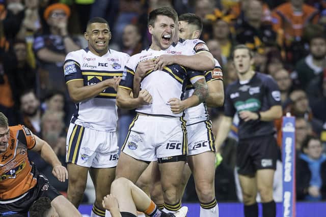 MAGIC MOMENT: Leeds Rhinos' Tom Briscoe is congratulated on scoring a try against Castleford in the 2017 Super League grand final at Old Trafford. Picture by Allan McKenzie/SWpix.com