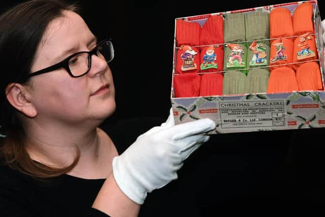 Nicola Pullan with a box of crackers dated between 1930-1959.