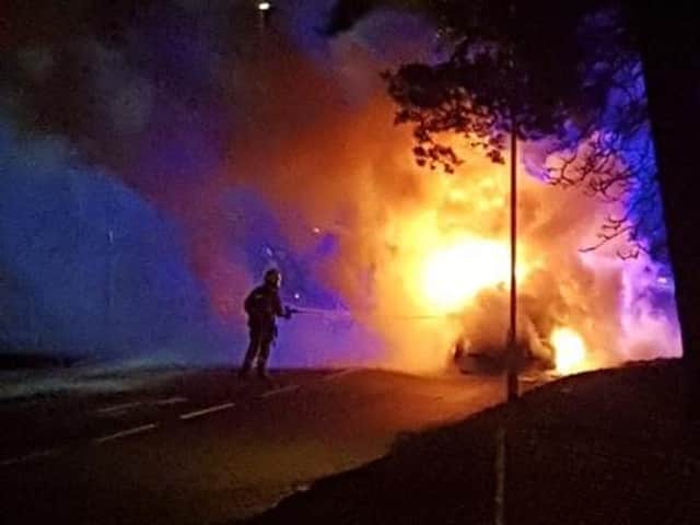 Crews used one hose reel to battle the car fire in Scarborough
