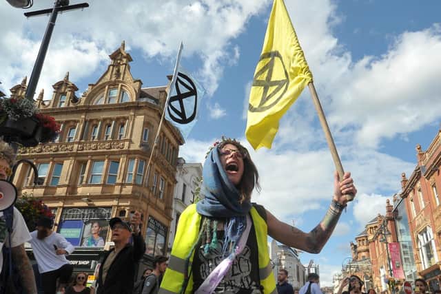 Protest group Extinction Rebellion stage a 'die-in' on Briggate in Leeds in July.