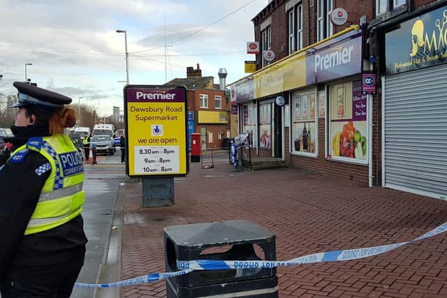 Two men have been arrested on suspicion of murder after a man was stabbed outside Premier supermarket on Dewsbury Road