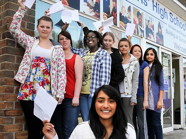 In the foreground is Iesha Mistry. Other A level high achievers are, left to right, Debrah Robinson, Lauren Rowley, Janet Magiga, Jessica Collins, Rachel Peacock, Natasha Brown, and Rabina Khaleeq.