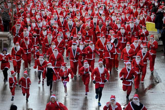Hundreds of runners took part in the Leeds Santa Dash for St Gemma's Hospice on Sunday. Picture: Simon Hulme