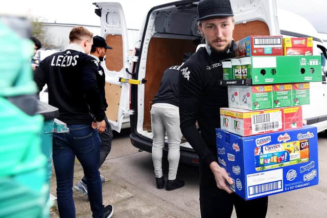 Luke Ayling was among the Leeds players who took time out to help the foodbanks last year as they prepared for demand over the festive season.