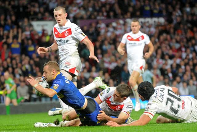 Rob Burrow scores the Rhinos' first try in the 2011 Grand Final victory over St Helens.