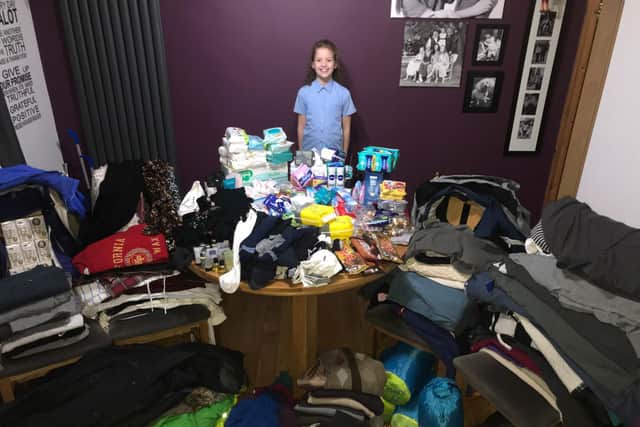Jolie Smith collected hundreds of items of warm clothing and wrote to local businesses asking for donations to buy items for the homeless over Christmas