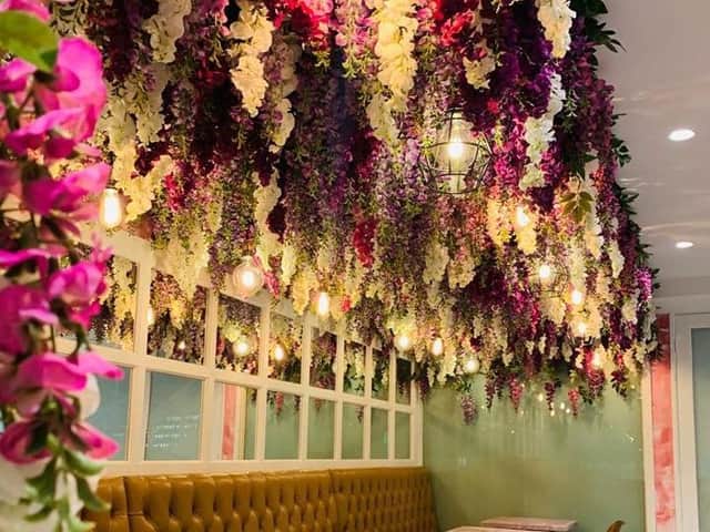 Fleur Cafe in The Light is festooned in stunning faux flowers. Pictures: Patryk Chapinski