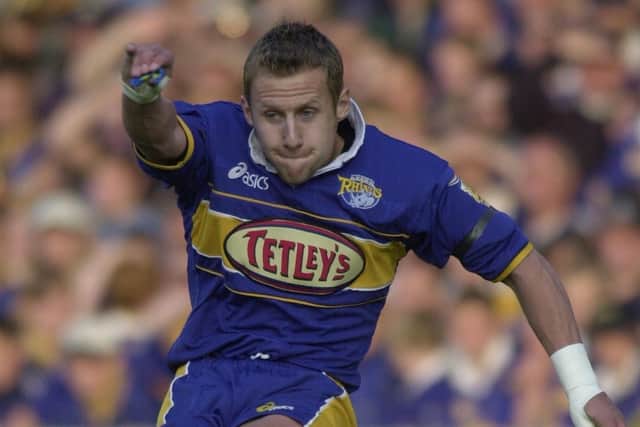Rob Burrow kicks for goal during his full debut for Leeds Rhinos against Warrington Wolves in 2001.