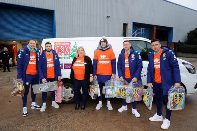 Leeds United playes help out at Mission Christmas, Millshaw, Leeds..Pictured from the left are Luke Ayling, Stuart Dallas, Lisa Sullivan, Liam Cooper, Barry Douglas, Pablo Hernandez.
Picture by Simon Hulme