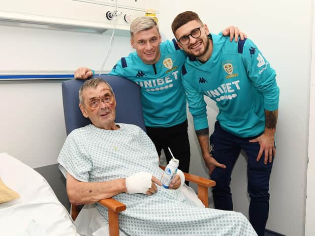 Leeds United players Gjanni Alioski and Mateusz Klich make a surprise visit to Leeds United fan Geoff Batty at Leeds General Infirmary. Geoff is recovering after he was knocked down by a car on his way to watch the recent Leeds match against Hull City.
Picture : Jonathan Gawthorpe
