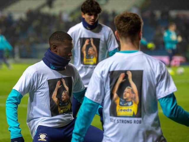 Leeds United's players wore t-shirts in support of Rob Burrow during the warm-up at Elland Road. (Bruce Rollinson)