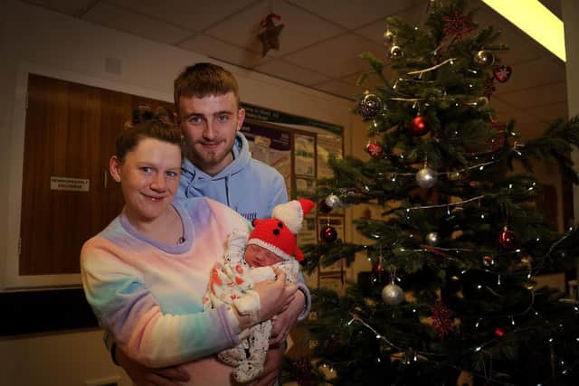 Gemma Moss with her partner Harry Farnham, pictured with baby Arabella, in the delivery suite at St James Hospital, Leeds on Christmas Day. Picture by Simon Hulme