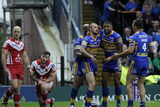 Luke Briscoe is congratulated after his crucial try agianst Salford in 2016. Picture by Bruce Rollinson.