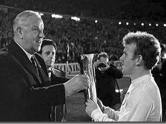 One of  Irving Crawford's photograph's of Billy Bremner with the Fairs Cup in 1968.