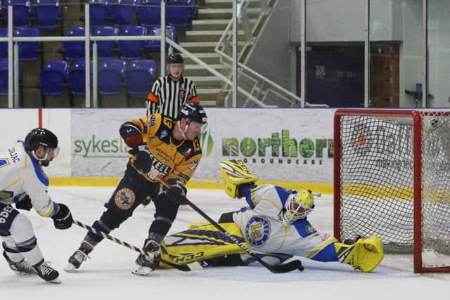 Craig Elliott backhands past Sam Gospel on the power play to make it 7-0 to Sheffield Steeldogs. Picture courtesy of Cerys Molloy.