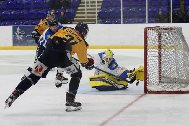 NOT THIS TIME: Alex Graham is denied by Sam Gospel in the New Year's Eve derby at Ice Sheffield. Picture courtesy of Cerys Molloy.