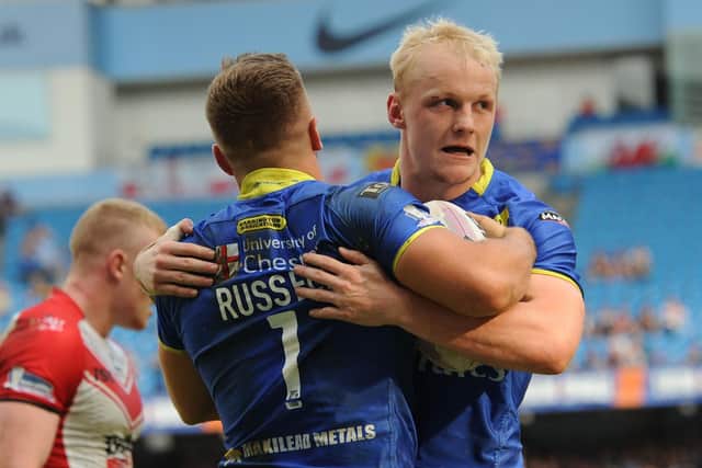 Leeds Rhinos' new signing Rhys Evans, right, in action for former club Warrington.