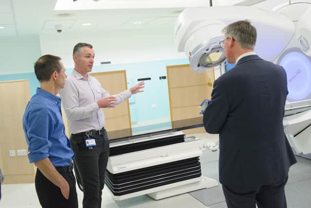 left to right: Chris Forrest, Leeds Teaching Hospitals Trust radiotherapy equipment manager; Peter Enever, Leeds Teaching Hospitals Trust radiotherapy technical lead;  Julian Hartley, Chief Executive, Leeds Teaching Hospitals Trust.