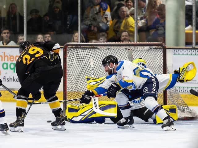 BAD NIGHT: Sam Zajac battling to stop Bracknell in last Sunday's 11-1 defeat to the Bees. Picture courtesy of Kevin Slyfield.