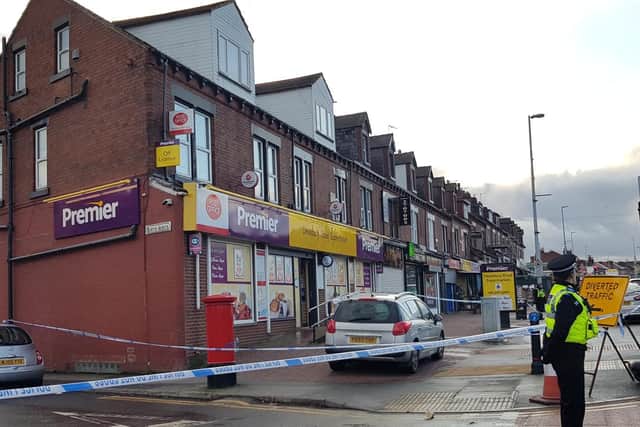 A police scene on Dewsbury Road, Beeston, the day after the fatal stabbing