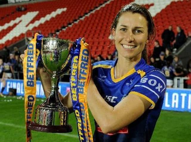 Leeds Rhinos captain Courtney Hill with the Betfred Women's Super League trophy