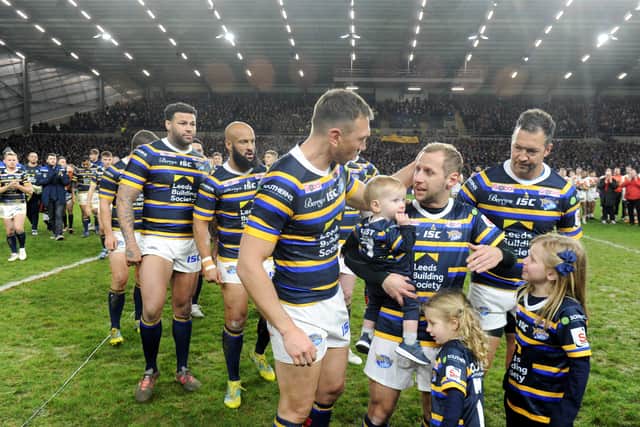 Kevin Sinfield, left, and Rob Burrow with family, team-mates and friends at last Sunday's Emerald Headingley sell-out. PIC: Steve Riding