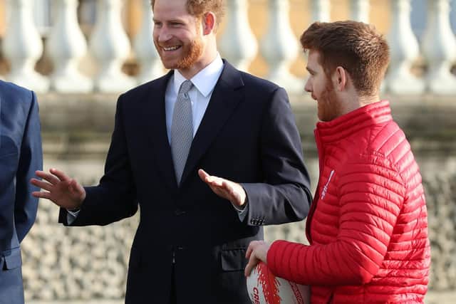 The Duke of Sussex talks with Leeds Rhino player, James Simpson, in the Buckingham Palace gardens, London, as he hosts the Rugby League World Cup 2021 draws