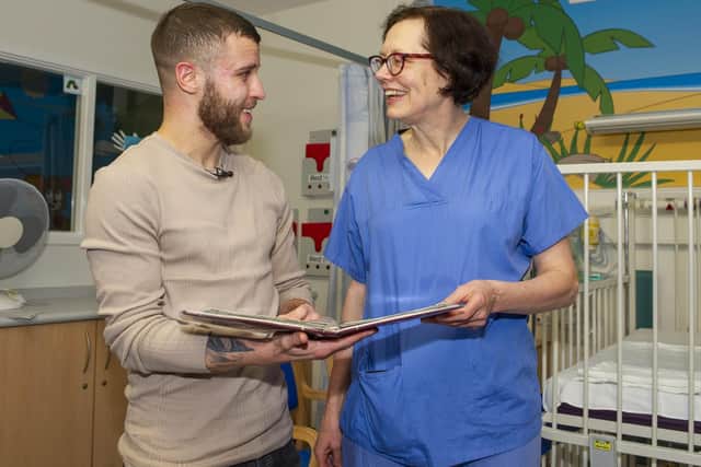 Tommy Frank  visited to the Leeds Childrens Hospital to meet Carin Van Doorn, the cardiac surgeon who performed his operation 21 years ago. 
Picture: Tony Johnson.