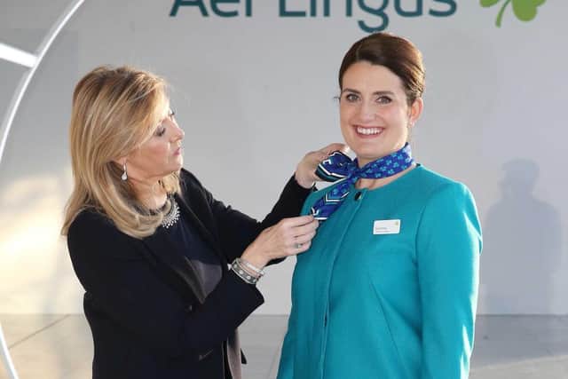 Designer Louise Kennedy applies finishing touches for Cabin Service Manager Aoife Costello