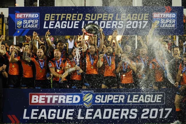 Castleford Tigers' captain Michael Shenton lifts the League Leaders Shield in 2017.