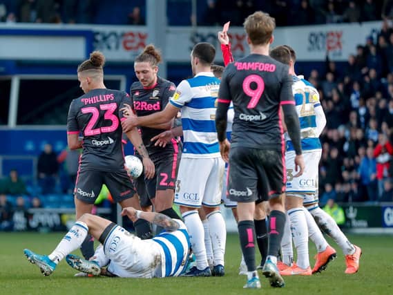 Leeds United midfielder Kalvin Phillips is shown a straight red card. (Pic: Bruce Rollinson)