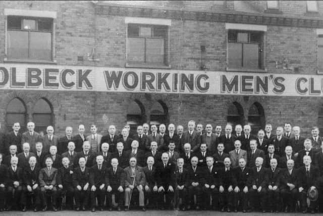 Members of Holbeck Working Men's Club wait to go on their annual trip to the seaside. (date unknown)