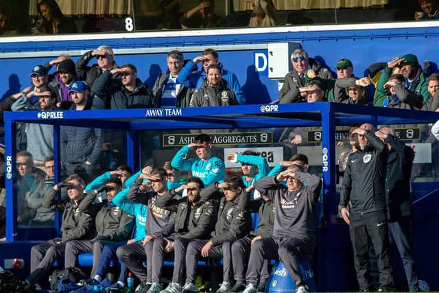 Leeds United's coaching staff look on at QPR. (Pic: Bruce Rollinson)