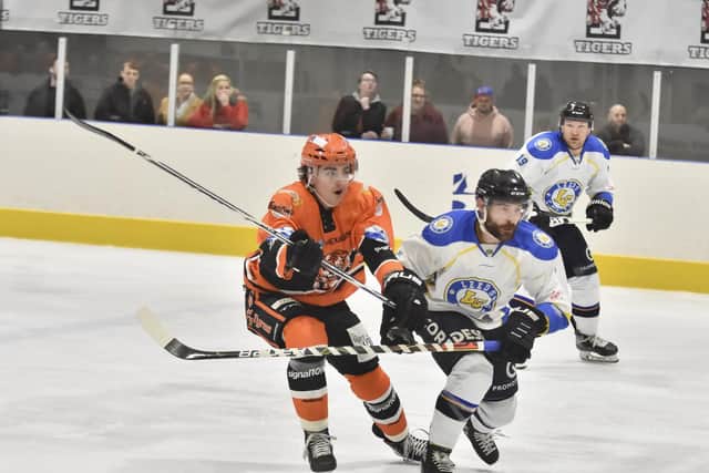 Leeds Chiefs' player-coach Sam Zajac, right, battles for possession with Telford's Brandon Whistle on Sunday. Picture courtesy of Steve Brodie.
