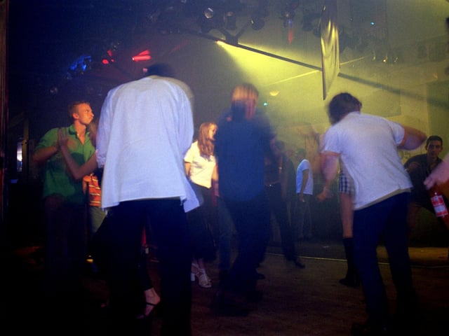 Clubbers dance the night away.