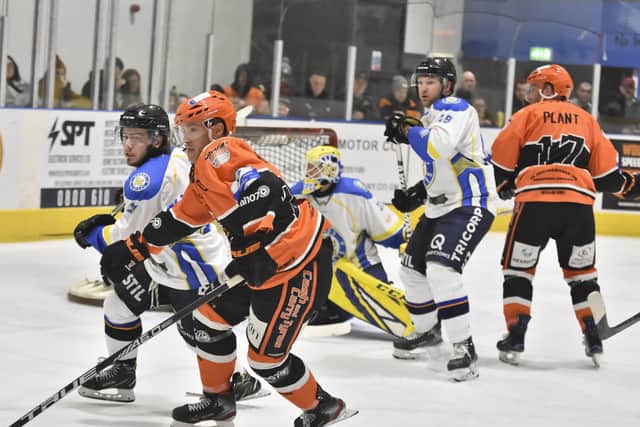 Lewis Houston battles for possession during last week's win over Telford Tigers last week. Picture courtesy of Steve Brodie.