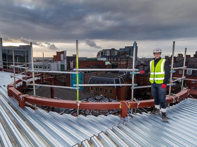 Eddy Bryan on the roof of the Majestic, with a view of Wellington Street and City Island in the back.