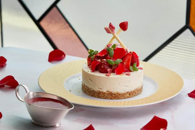 The limited-editionwhite chocolate cheesecake for two, with red berries and decorated with rose petals