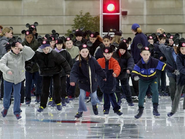 Quarry Mount Primary School pupils take to the ice wearing Mickey Mouse ears.