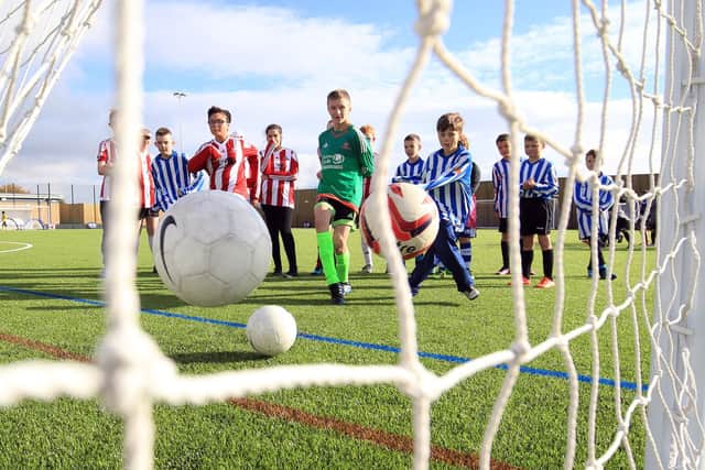 Young footballers playing at a Parklife facility in Sheffield. Picture: Chris Etchells.