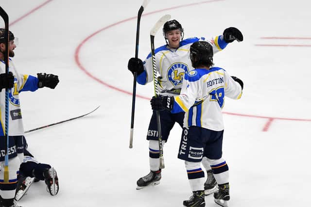 Lewis Houston (No 18) celebrates wioth Adam Barnes after becoming the first player to score at Elland Road, but it couldn't prevent a 4-1 defeat to Sheffield Steeldogs. Picture: Jonathan Gawthorpe.