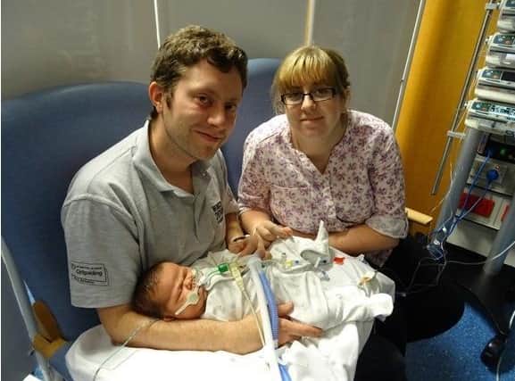 Claire and Andrew McLellan pictured in hospital with baby daughter Alexandra