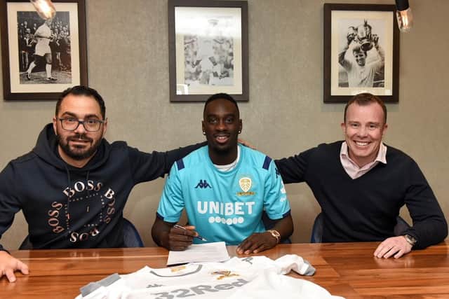 Jean-Kevin Augustin, pictured here signing last Monday, had his first match minutes for Leeds United Under 23s at Sheffield Wednesday this week