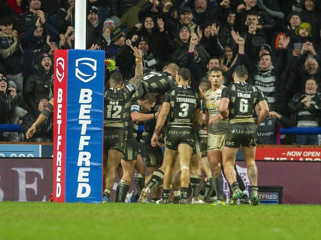 Hull FC players celebrate as Stevie Ward watches on.