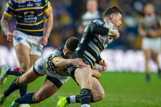 Stevie Ward makes a tackle agianst Hull.Picture by Tony Johnson.