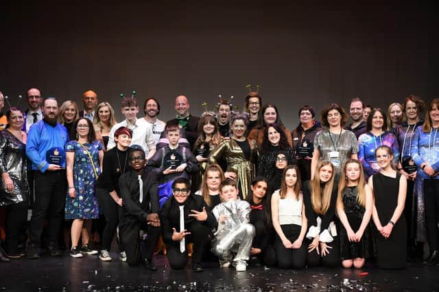 The winners and sponsors on stage.