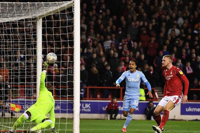 DENIED: Nottingham Forest keeper Brice Samba keeps out Liam Cooper's header in the second half of Leeds United's 2-0 loss at the City Ground.