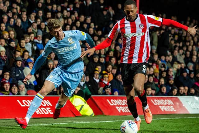 Leeds United's Patrick Bamford and Brentford's Ethan Pinnock battle at Griffin Park. (Pic: Bruce Rollinson)